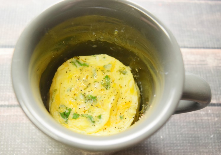 Add all kinds of ingredients to make an omelet in a mug