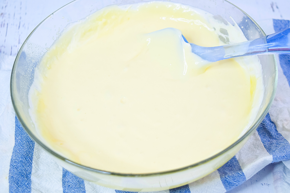 Microwave Lemon Curd and Whipped Cream mixed together to make Lemon Mousse