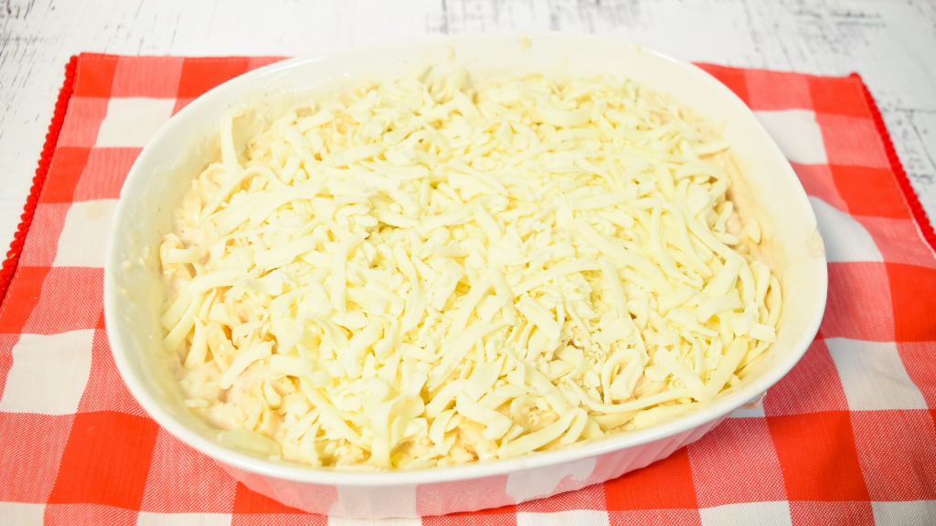 Shredded whole milk mozzarella over the top of the chicken fettuccine alfredo pasta bake.
