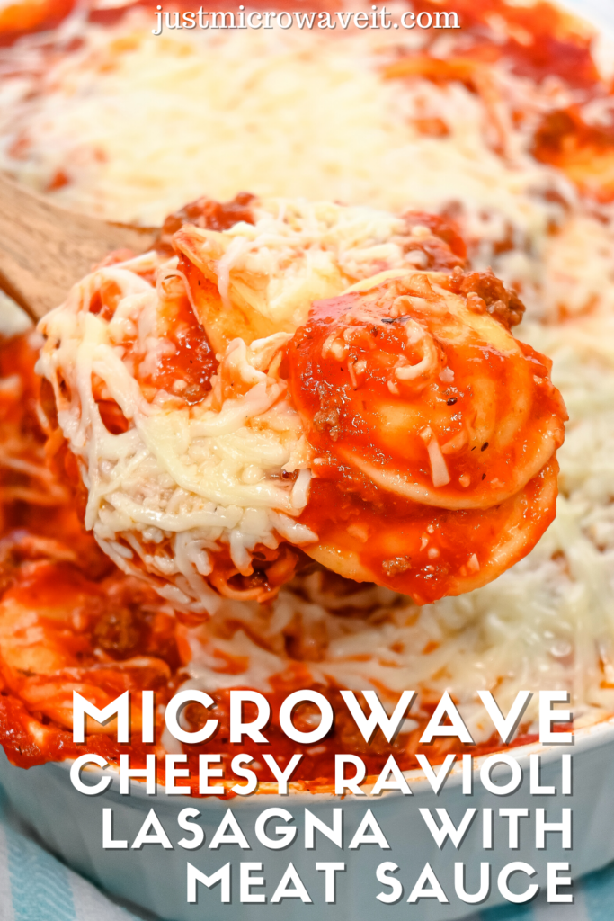 Close up image of a scoop of microwave cheesy ravioli lasagna with meat sauce. 