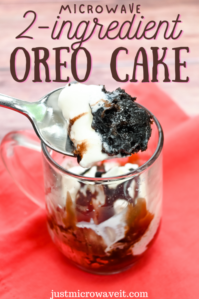 Close up of a spoonful of 2 ingredient oreo cake over a glass mug with whipped cream and chocolate syrup
