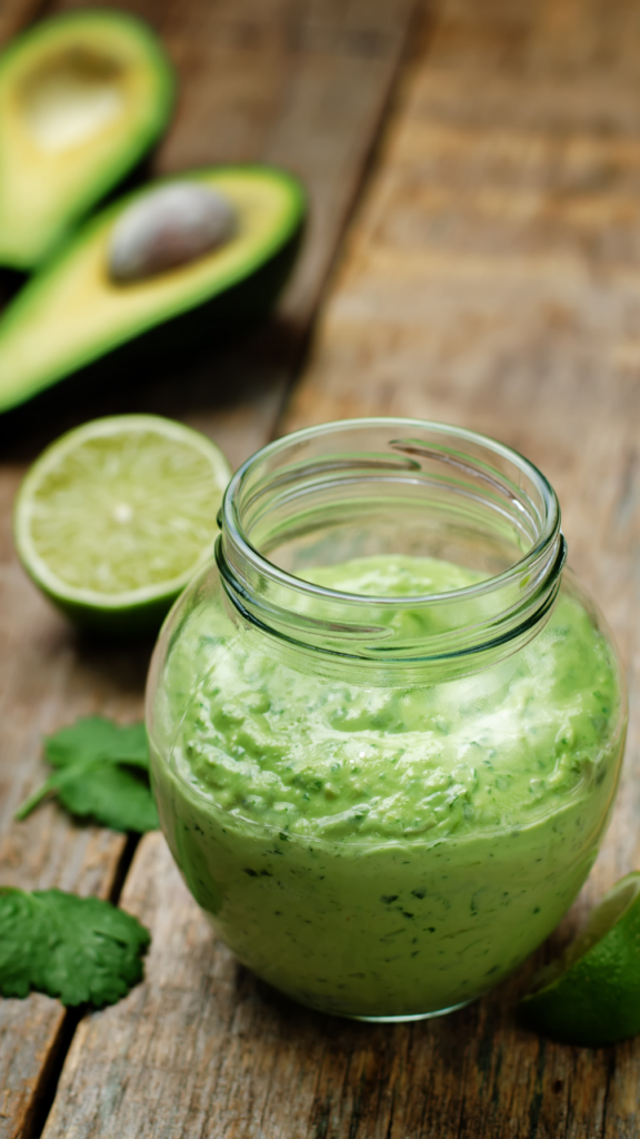 Close up image of a mixture of avocado cilantro and lime 