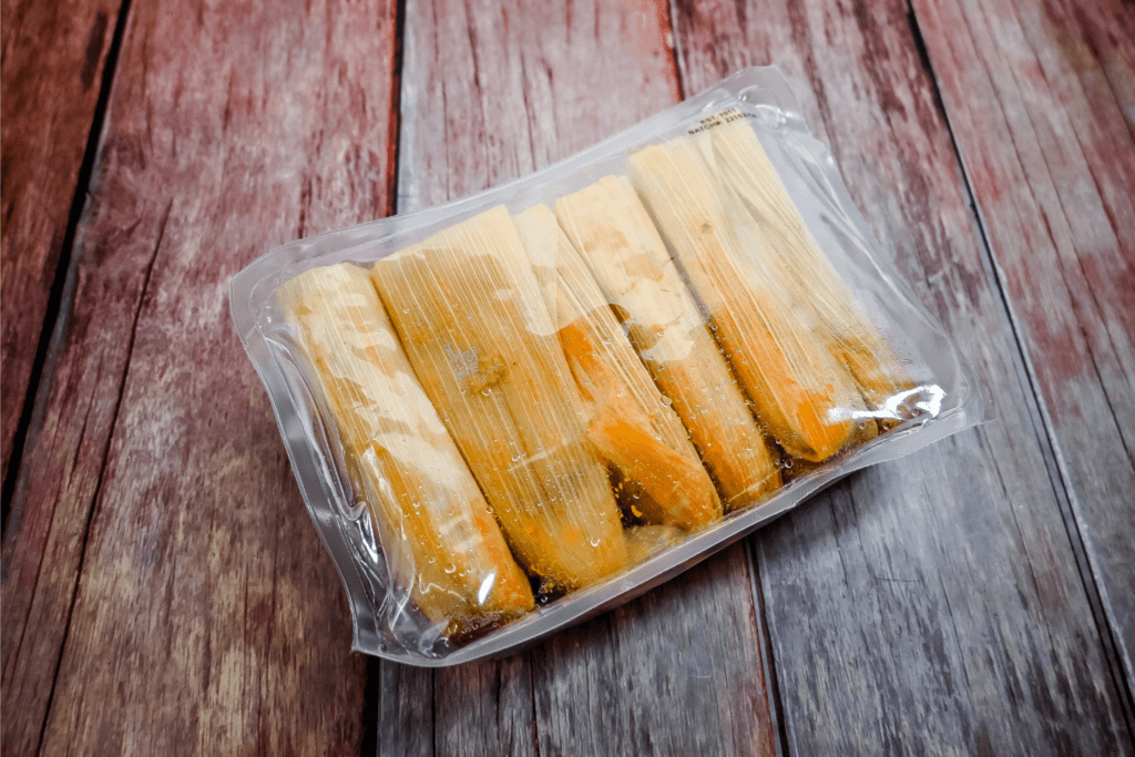 Tamales still in the package. 