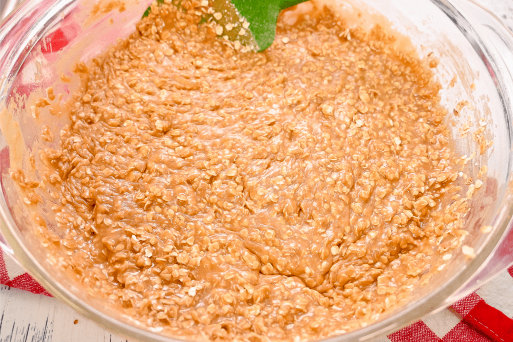 Mixing up the oats into the cookie batter