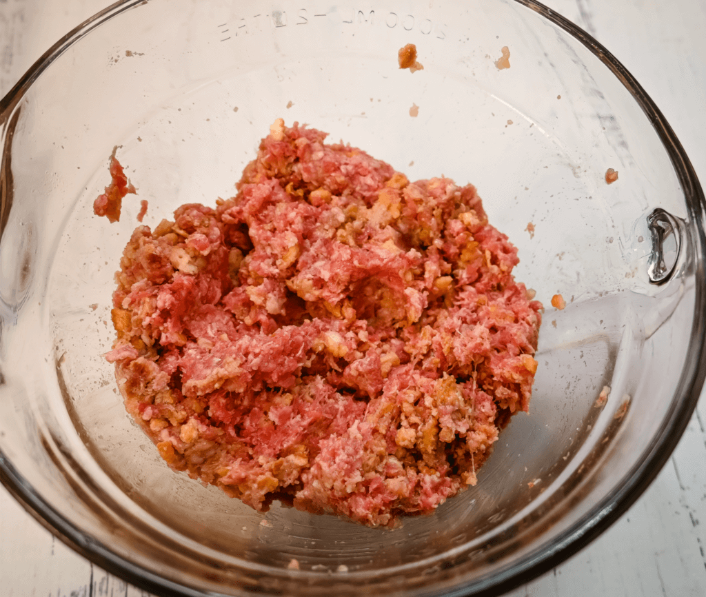 Ground Beef mixed with ingredients to make salisbury steak