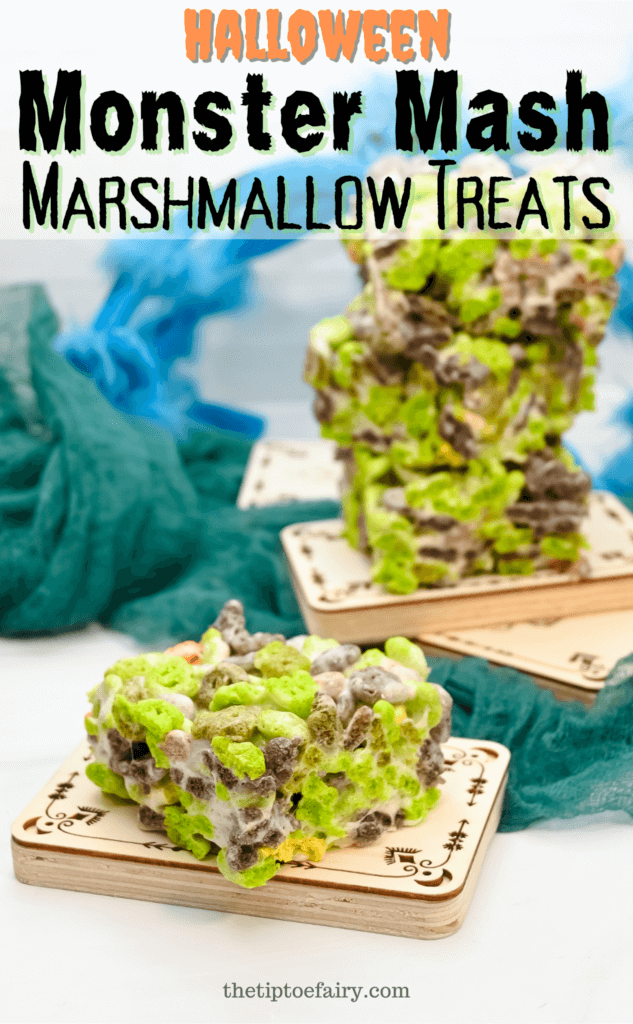 Title image with squares of halloween monster mash marshmallow treats on wooden blocks of tarot cards on green gauze with a blue spider in the background
