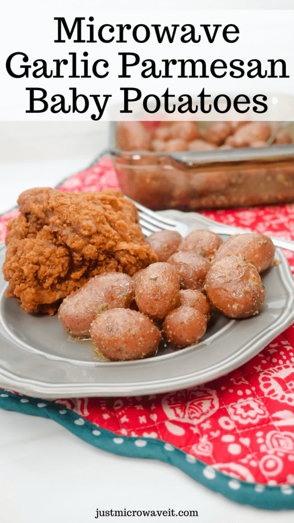 A close up shot of a plate with fried chicken and microwave garlic parmesan baby potatoes