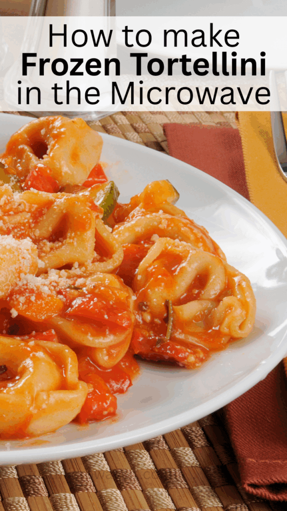 Close up title image of cheese tortellini with red sauce and parmesan cheese on a white plate.
